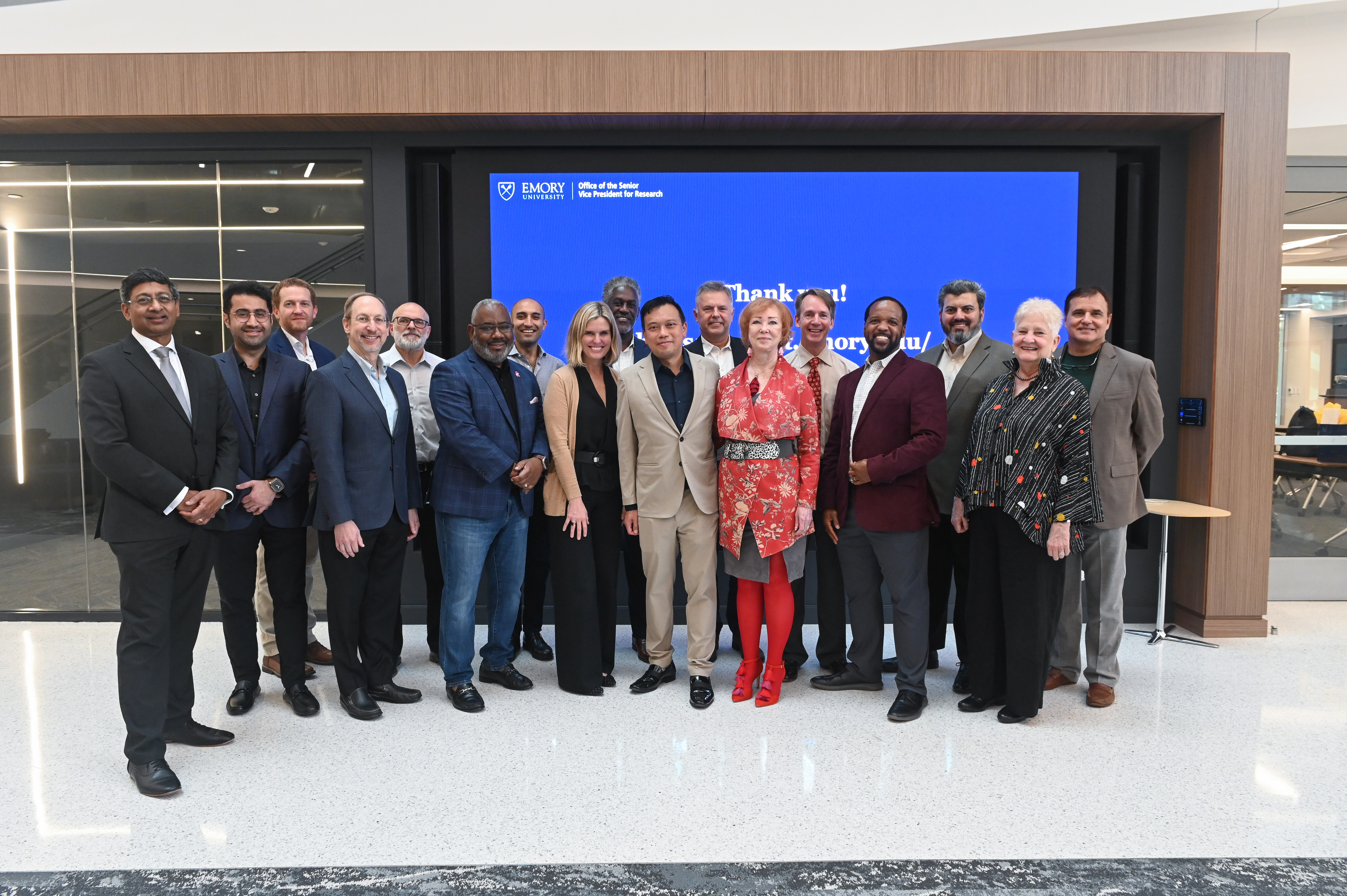 ADJUST Center Launch picture with leadership and industry stakeholders